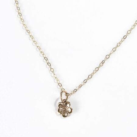 A beautiful dainty yellow bronze flower hung on gold-filled chain. Perfect gift for daughter, sister, friend