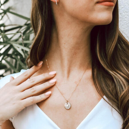 A dainty disc with a heart soldered on it and a name hand-stamped. Personalized necklace for wife.