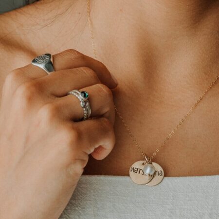 Personalized necklace for mom, wife, daughter. A gold-filled dainty disc with hand stamped names