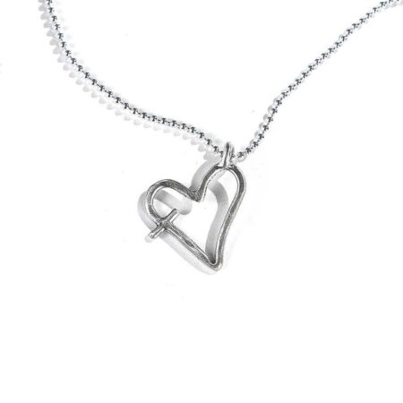 An imperfect heart, hand forged in beautiful sterling silver and hung on a sterling silver chain Perfect necklace for a friend, sister, colleague.