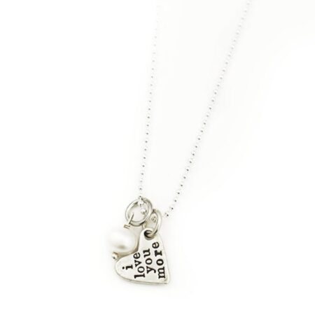 2 small sterling hearts with "i love you more” hand stamped on the back. Great gift for wife, fiancee, friend