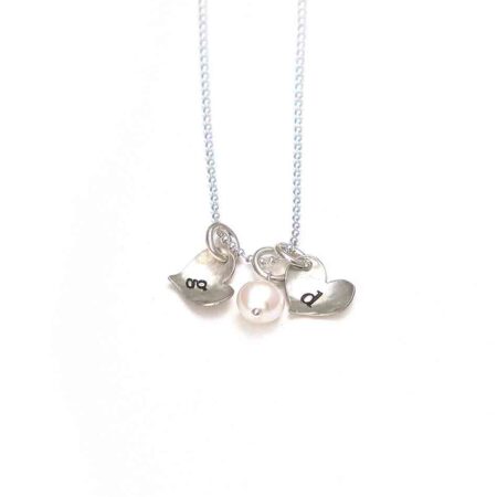 Personalized initials necklace for mom, wife. Sterling silver hearts with hand stamped initials