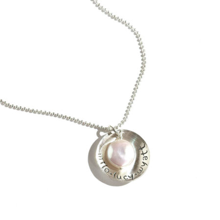 Sterling silver disc hand stamped with names. Perfect personalized necklace for mom, grandma