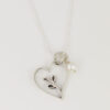 Hand-forged sterling silver heart charm necklace, a stunning gift for parents, parents-to-be or new moms